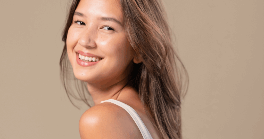 Smiling woman with radiant skin after IV rejuvenation and aesthetic treatment at Chic la Vie Medical Spa in Las Vegas