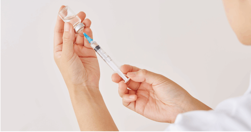 Medical professional preparing a Vitamin B12 injection at Chic la Vie Medical Spa in Las Vegas to boost energy and wellness.